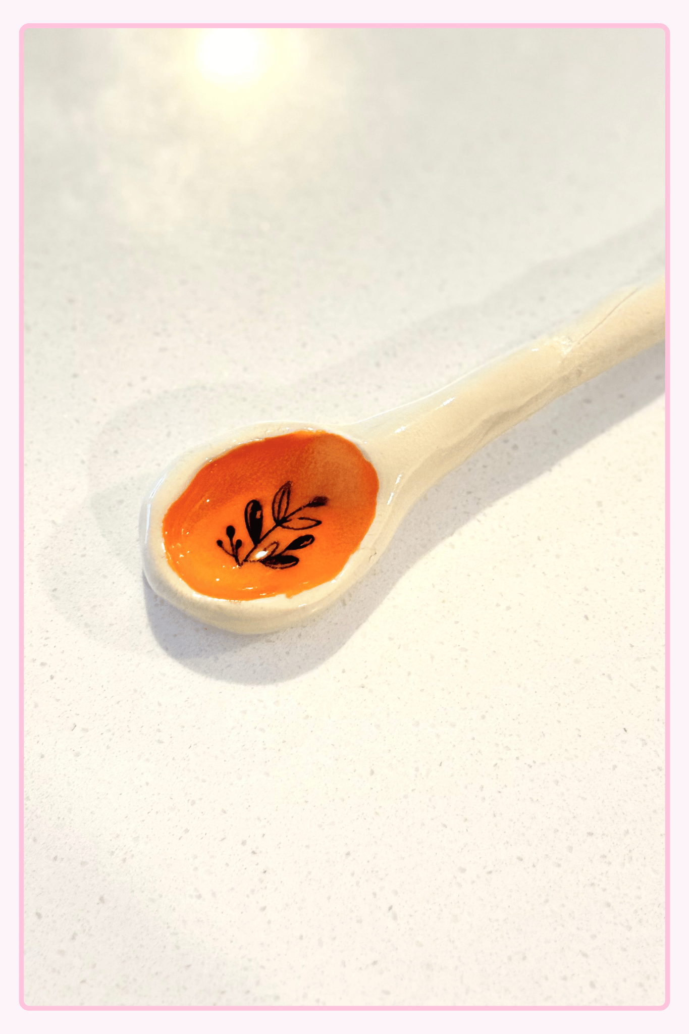 Organic Orange Stoneware spoons - plant